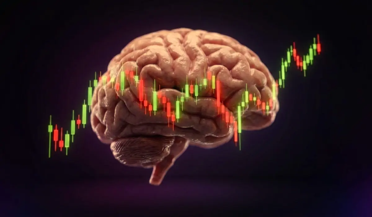 Trader analyzing market charts while managing emotions such as greed, fear, and FOMO during trading decisions.